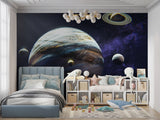 Space themed wall mural with planets in home office setup