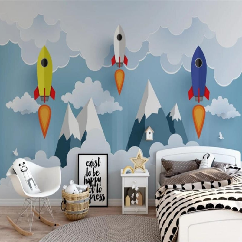 Rocket wallpaper mural displayed in a playful nursery setting with white furniture