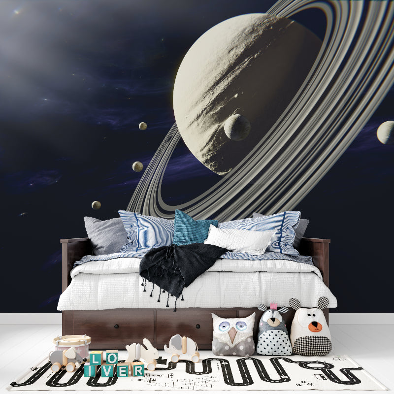 Space mural wallpaper transforming gaming room with dramatic Saturn view