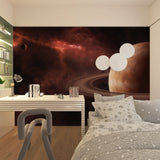 Space mural with burgundy nebula adding warmth to home office setup