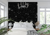 Star pattern wallpaper creating an immersive feel in a reading nook