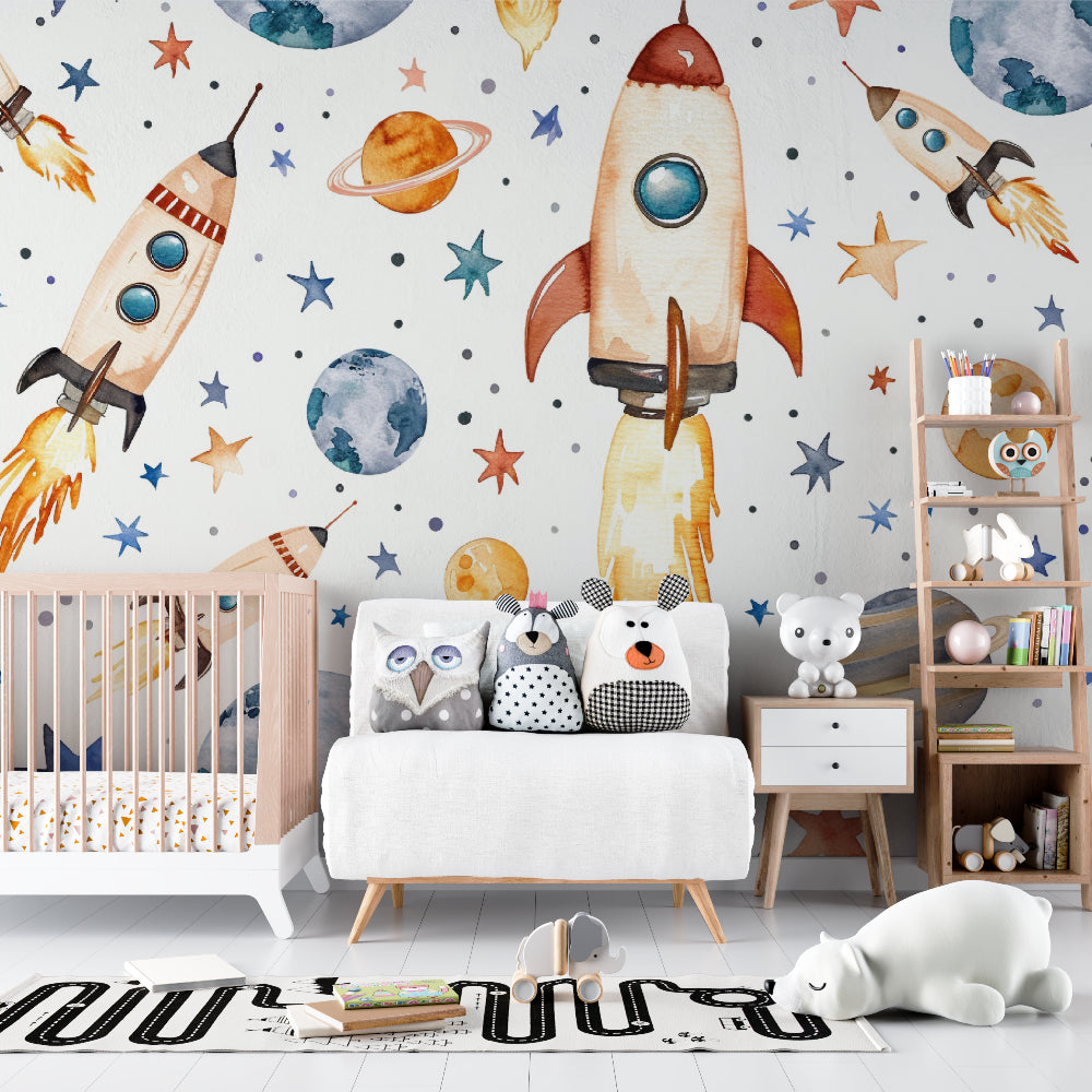 Kids bedroom with space mural wallpaper featuring gentle watercolor planets and rockets