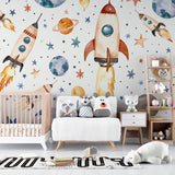 Kids bedroom with space mural wallpaper featuring gentle watercolor planets and rockets