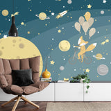 Space wallpaper with floating fox in modern nursery, soft teal and yellow tones create dreamy atmosphere