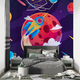Galaxy wallpaper featuring rockets and planets in a modern gaming room setup