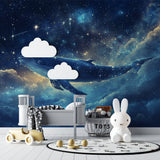 Reading nook with space whale wallpaper creating dreamy environment