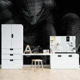 Black superhero wallpaper making statement in home office with modern furniture
