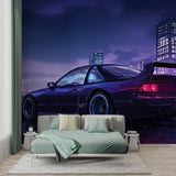 Gaming room featuring sports car night city wallpaper with neon reflections