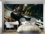 Racing car wall mural displayed in teen bedroom with gaming setup