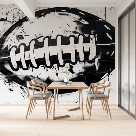 Football wall mural creating a striking focal point in a modern living room with minimalist furniture