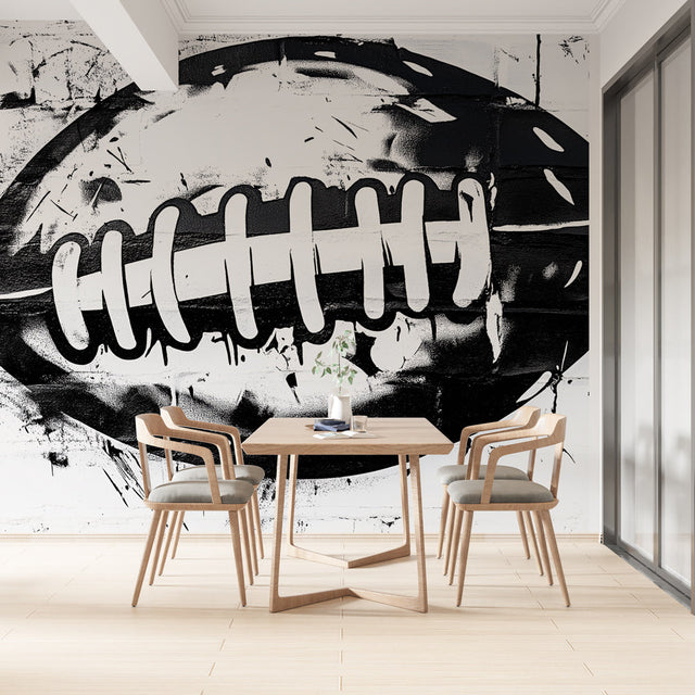 Football wall mural creating a striking focal point in a modern living room with minimalist furniture