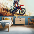 Motocross wallpaper bringing energy to a modern teen bedroom with gaming setup