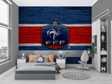 French football mural in sports bar setting with flat-screen TVs