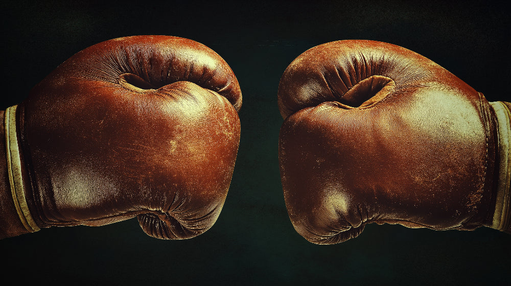 Boxing Gloves Wallpaper design file showing detailed leather texture and dramatic shadows