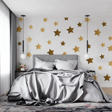 Golden star wallpaper bringing warmth to a modern living room with natural light