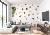 Star pattern mural in a cozy bedroom setting with soft lighting