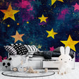 Stars galaxy wallpaper in cozy kids bedroom with soft lighting showing magical nighttime effect