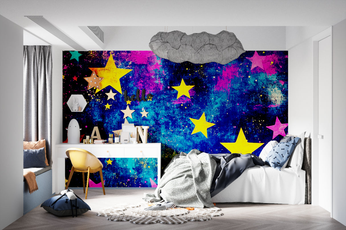 Colorful stars wallpaper bringing magic to teenage bedroom with study area