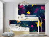 Galaxy wallpaper creating depth in small bedroom with minimal furniture