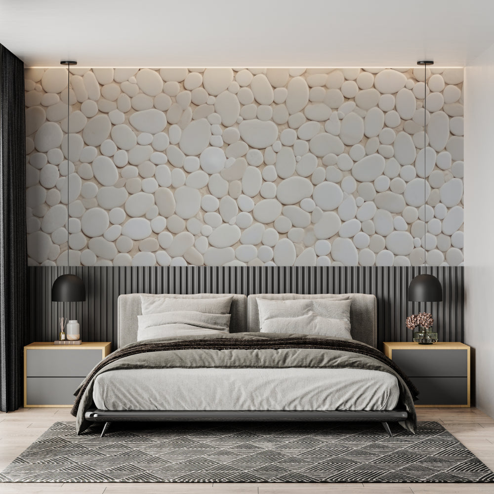 Stone effect wallpaper bringing natural texture to a minimal bedroom wall
