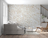 White pebble wall mural adding depth to a peaceful living room