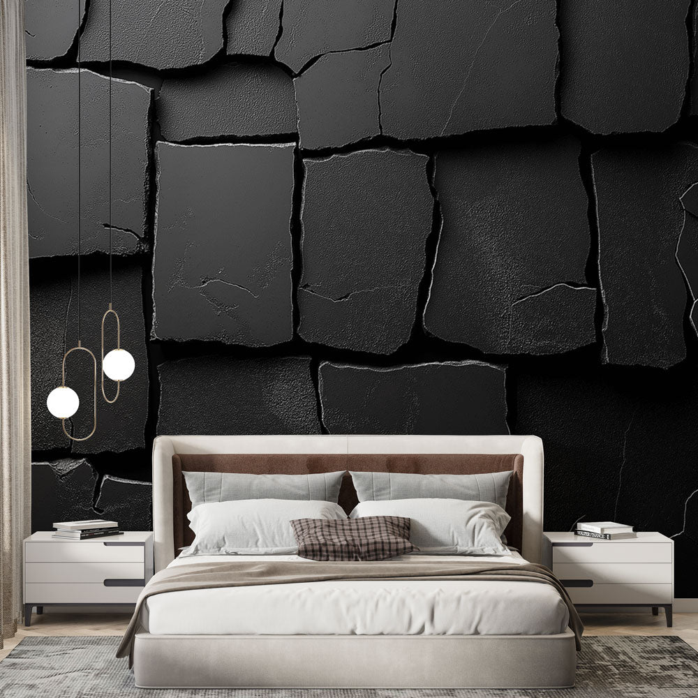 Black stone textured wallpaper creating dramatic accent wall in modern living room with sleek furniture