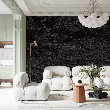 Black stone textured wallpaper in modern living room creating dramatic accent wall