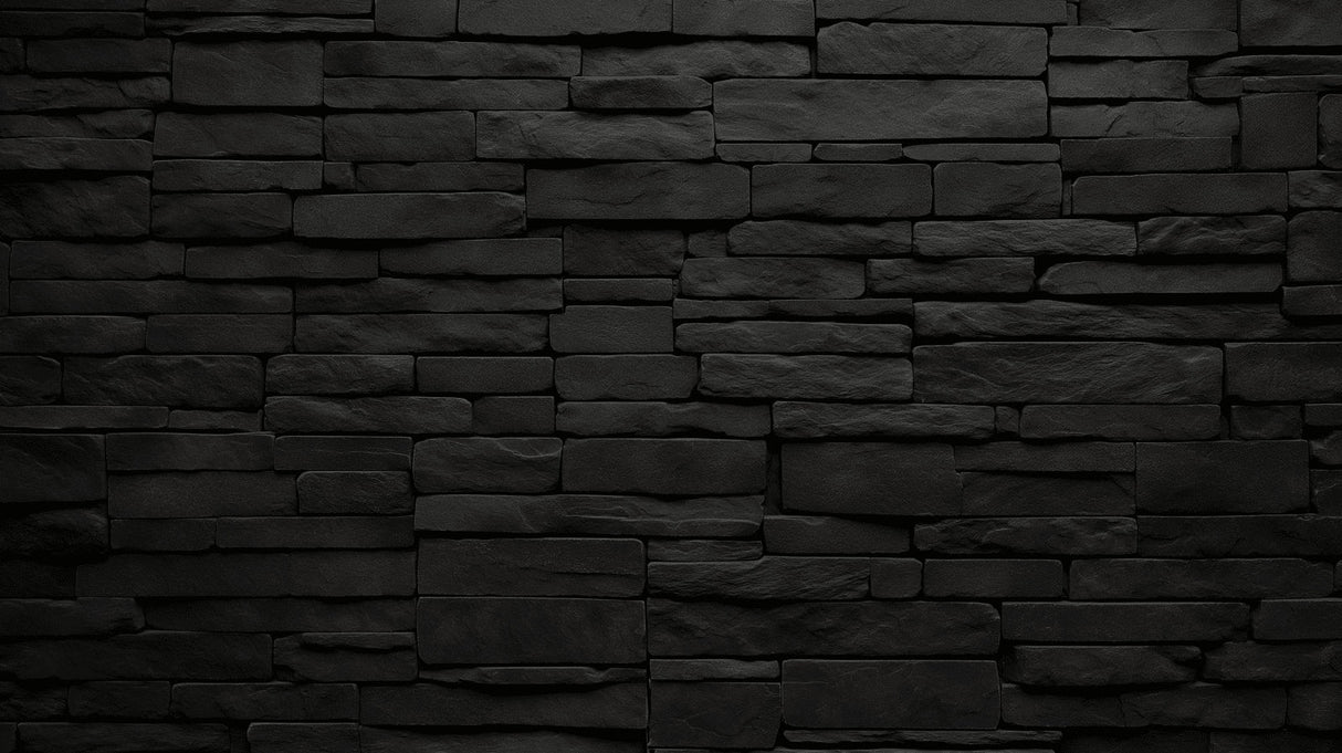 Black stone wall mural creating drama in modern living room with gray sofa and metal accents