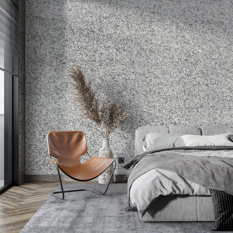 Stone effect wallpaper in modern living room showing grey speckled pattern creating depth