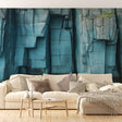 Blue stone wall mural in modern minimalist living room, creating dramatic architectural impact with geometric rock patterns