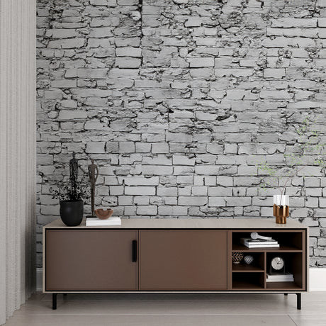 Grey stone wallpaper in modern living room creating industrial charm with natural light