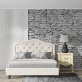 Stone wallpaper creating urban feel in modern kitchen space