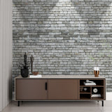 Grey brick wallpaper detail in kitchen highlighting realistic texture