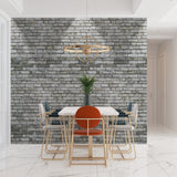 Industrial stone mural creating feature wall in bedroom