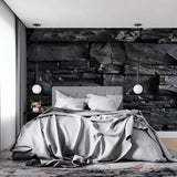 Black stone wallpaper in modern living room with gray sofa and minimalist decor