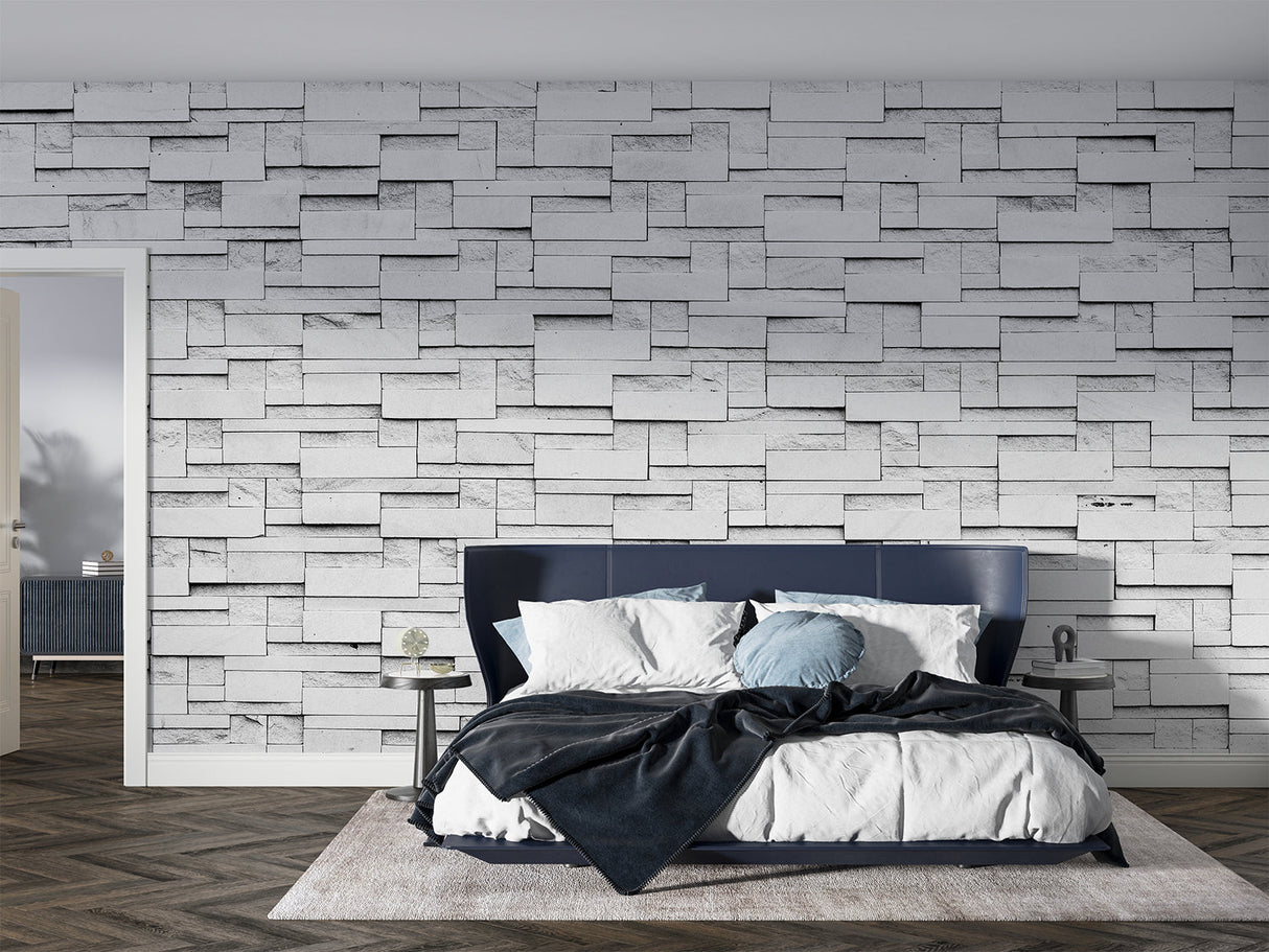 Modern grey stone block wallpaper in a minimalist living room creating depth and sophistication