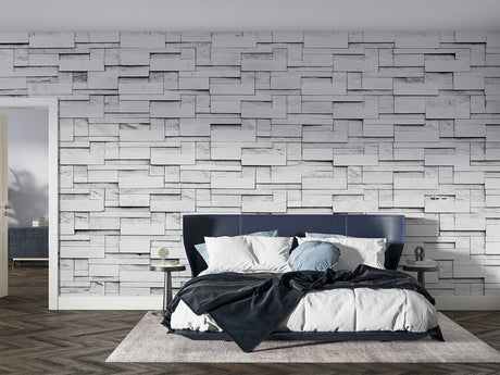 Modern grey stone block wallpaper in a minimalist living room creating depth and sophistication
