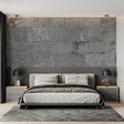 Modern grey stone block wallpaper in contemporary living room with minimal furniture