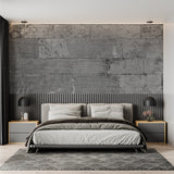 Modern grey stone block wallpaper in contemporary living room with minimal furniture
