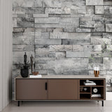 Grey stone wall mural adding texture to a contemporary bedroom