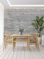 Modern grey stone wallpaper with horizontal lines in contemporary living room setting