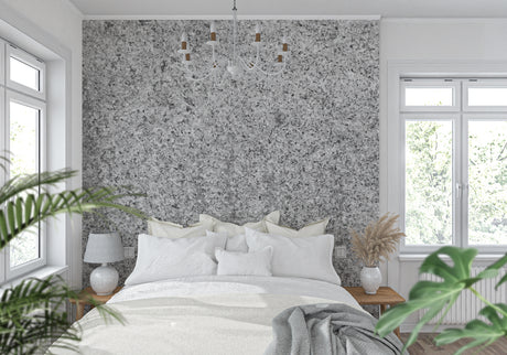 Modern grey stone wallpaper in luxury living room setting, creating an elegant accent wall behind modern furniture