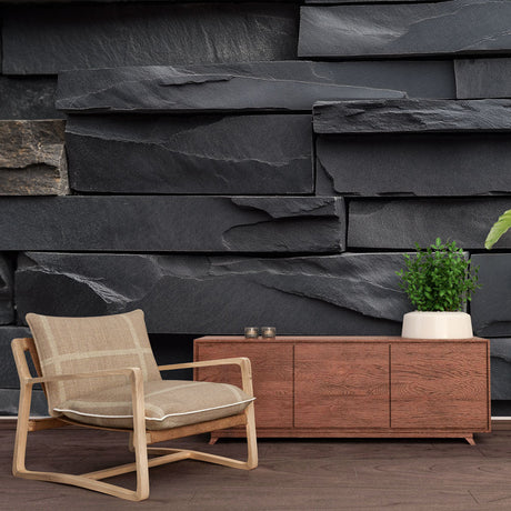 Modern living room showcasing dramatic Stone Mural Wallpaper with layered slate effect creating depth and sophistication