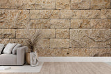 Stone block wallpaper creating a stunning accent wall in a modern living room with beige and natural tones