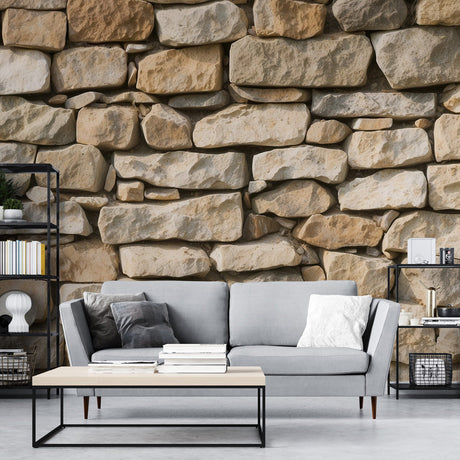 Stone wall mural in a modern living room showing natural limestone texture with warm lighting creating depth and dimension
