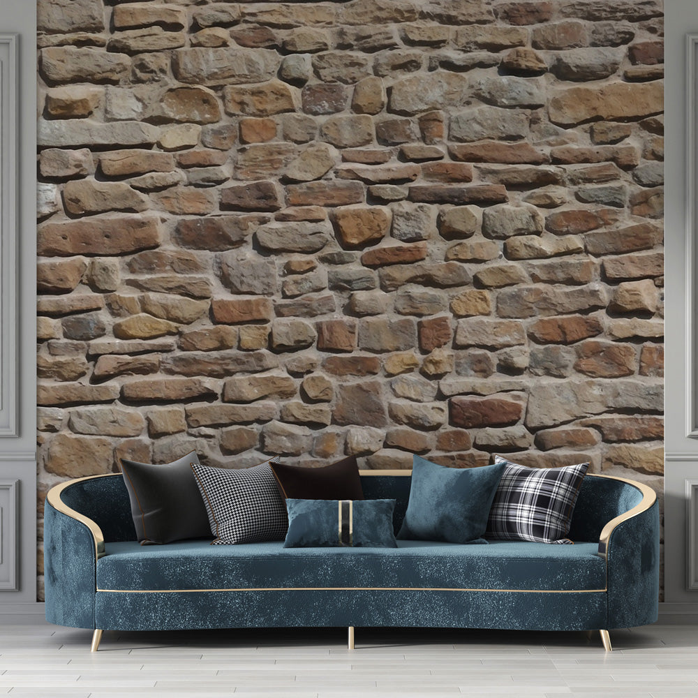 Stone wall mural in modern living room showing textured beige and terracotta tones creating warm atmosphere
