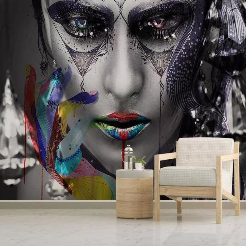 Street art face wallpaper creating bold impact in modern living room with grey sofa and minimal decor