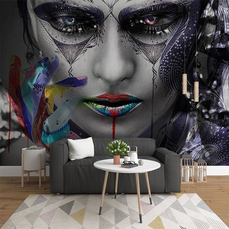 Urban art mural wallpaper transforming creative studio space with dramatic portrait and rainbow colors