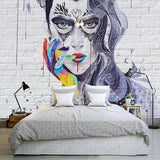 Abstract mandala portrait mural wallpaper transforming an urban coffee shop wall with vibrant colors