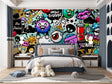 Street art graffiti wallpaper creating bold impact in modern teen bedroom with gaming setup